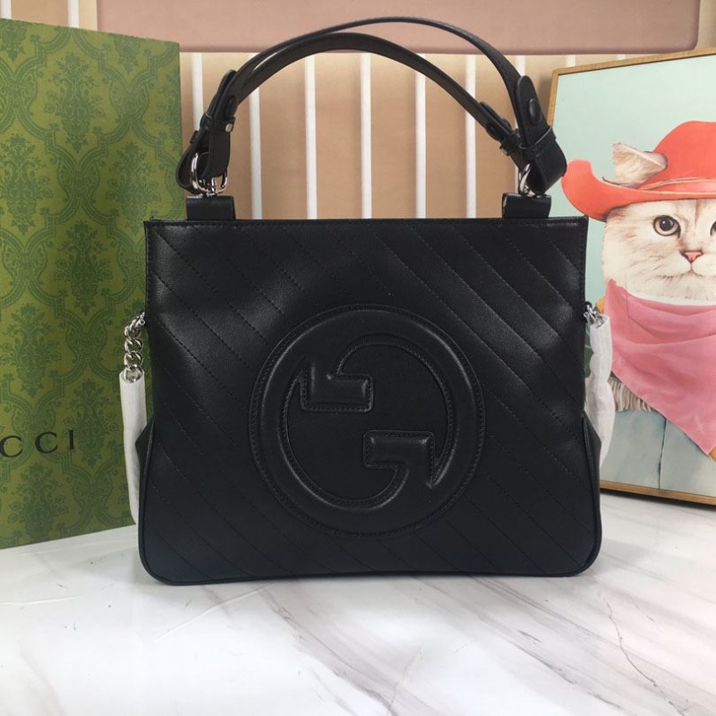G*u*i shopping bags